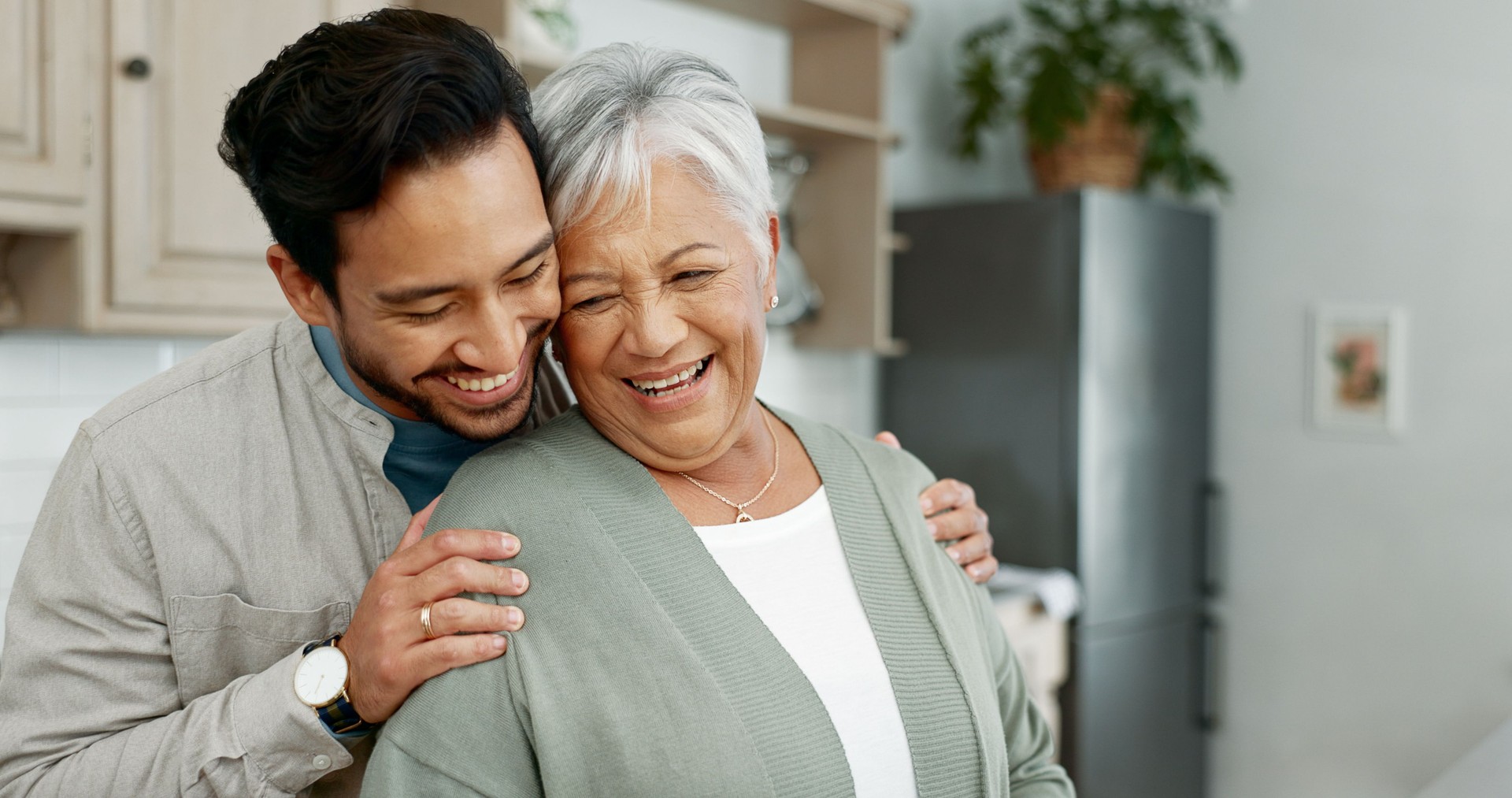 Home, senior mother and son with hug for care, comfort and assurance, enjoying respite care
